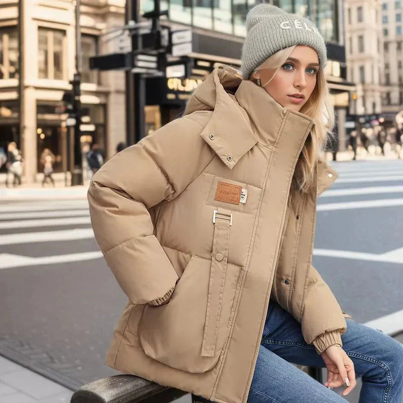 Hainie Casaco Acolchoado Impermeável para Mulher – Casaco de Inverno Quente com Capuz e Corte Oversize