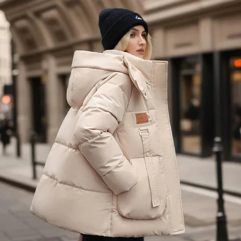 Hainie Casaco Acolchoado Impermeável para Mulher – Casaco de Inverno Quente com Capuz e Corte Oversize