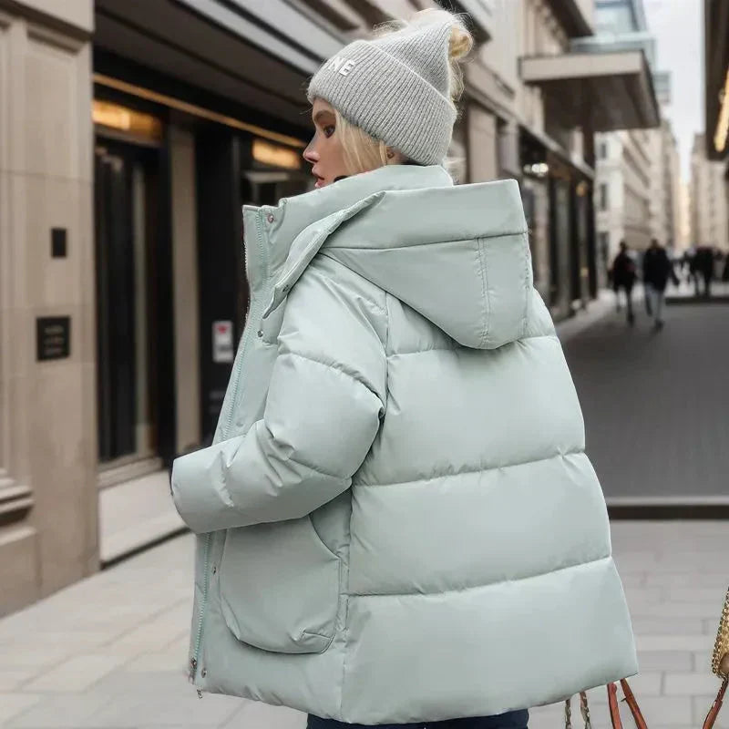 Hainie Casaco Acolchoado Impermeável para Mulher – Casaco de Inverno Quente com Capuz e Corte Oversize