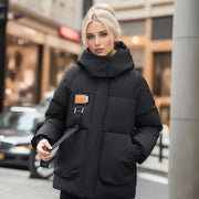 Hainie Casaco Acolchoado Impermeável para Mulher – Casaco de Inverno Quente com Capuz e Corte Oversize