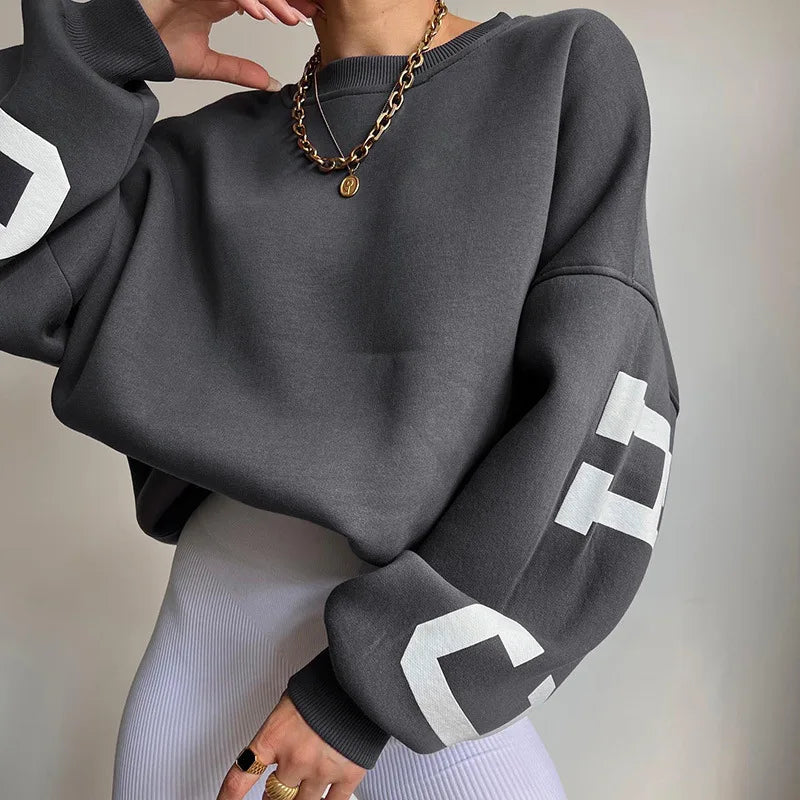 Bluza Arvery Oversize Damska – Bawełniany Sweter z Graficznymi Rękawami i Okrągłym Kołnierzem