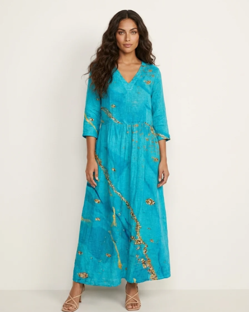 Marigold Maxi Ruha Nőknek – Virágos V-nyakú Ruha Zsebekkel, Elegáns, Laza Vágással