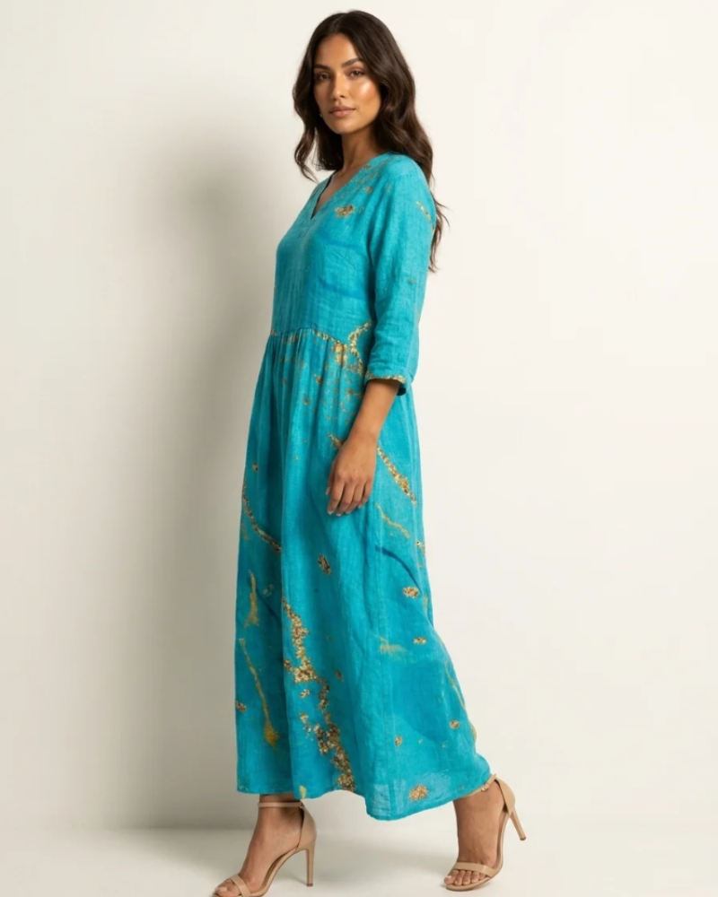 Marigold Maxi Ruha Nőknek – Virágos V-nyakú Ruha Zsebekkel, Elegáns, Laza Vágással