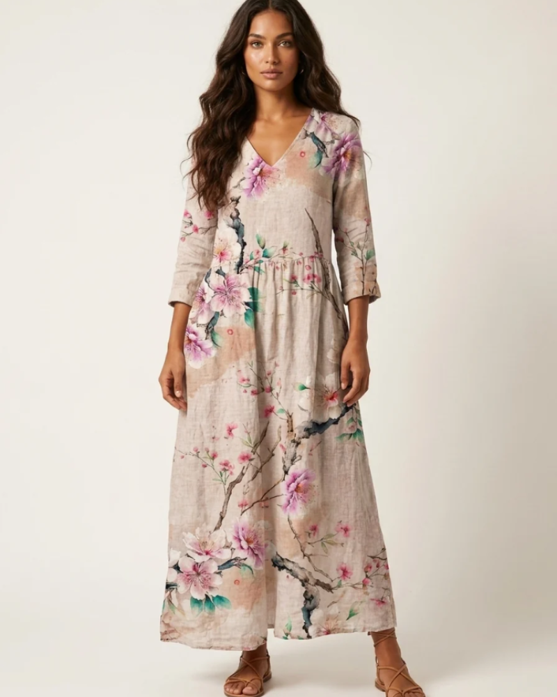 Marigold Maxi Ruha Nőknek – Virágos V-nyakú Ruha Zsebekkel, Elegáns, Laza Vágással