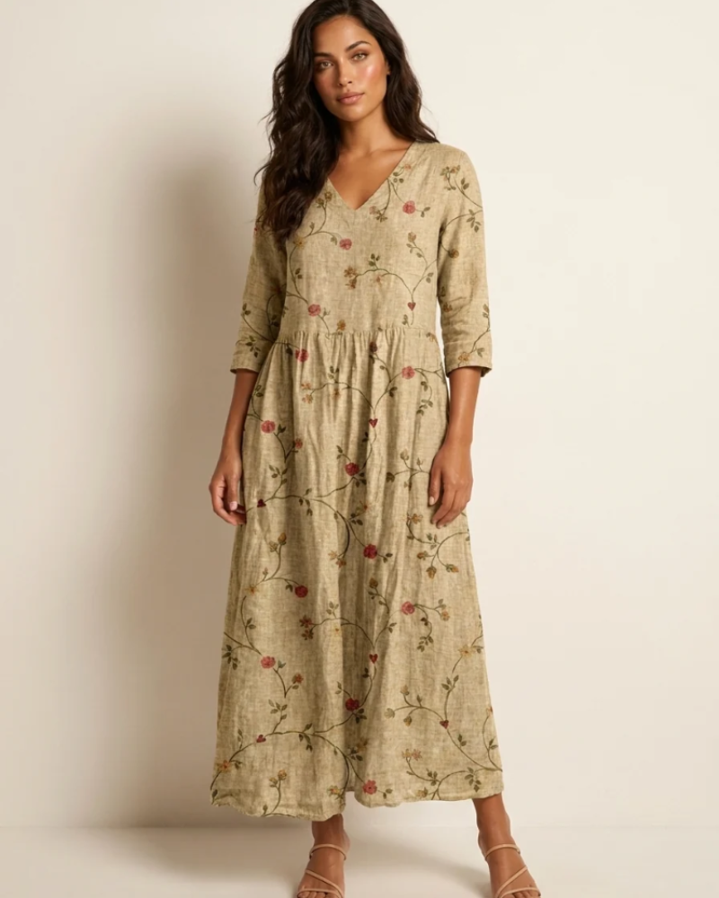 Marigold Maxi Ruha Nőknek – Virágos V-nyakú Ruha Zsebekkel, Elegáns, Laza Vágással
